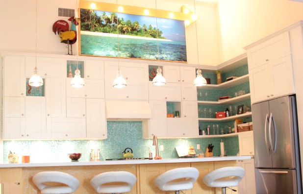 white key west house tour kitchen cabinets in vaulted ceiling kitchen with marquee sign above cabinets