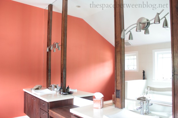 bathroom vanity lights installed directly onto counter to ceiling mirrors