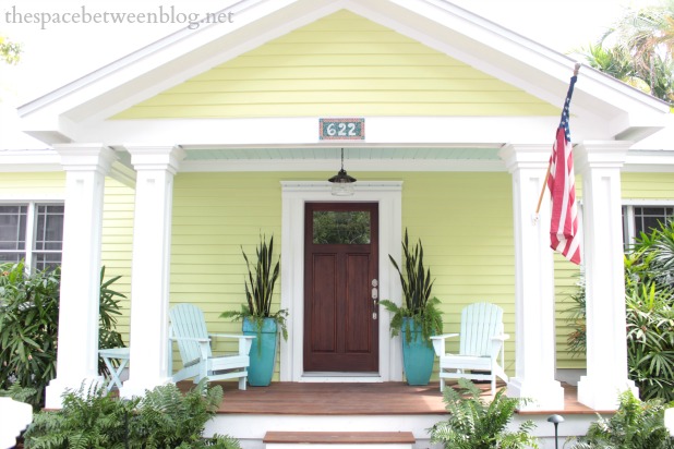 Front porch of a key lime pie painted house, the beginning of the Key West house tour