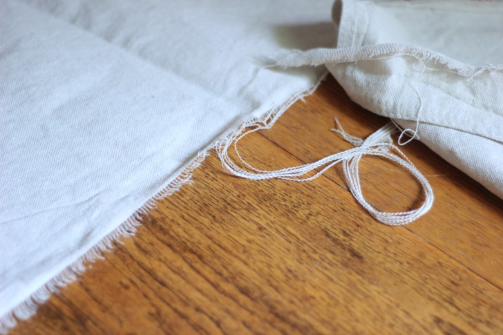 DIY grain sack table runner with a canvas drop cloth