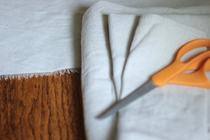 DIY grain sack table runner with a canvas drop cloth