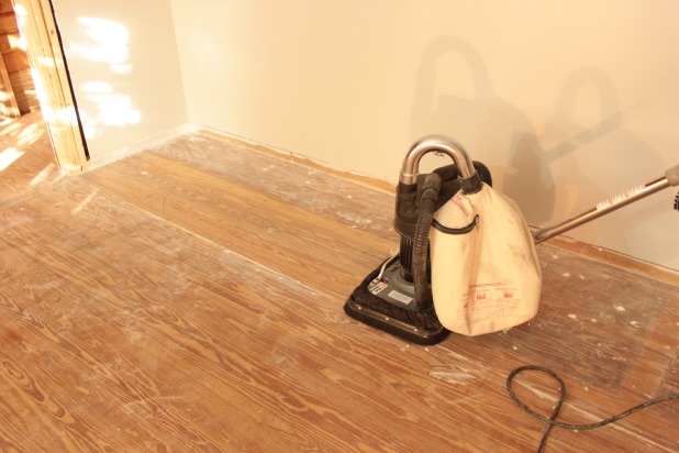 guest bedroom hardwood floor restoration {the square buff sander way}