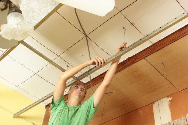 removing the drop ceiling in the guest bedroom 