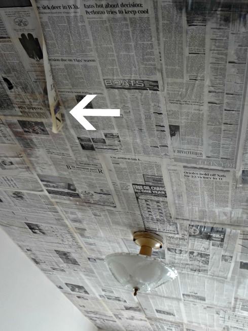 newspaper as a creative wall covering