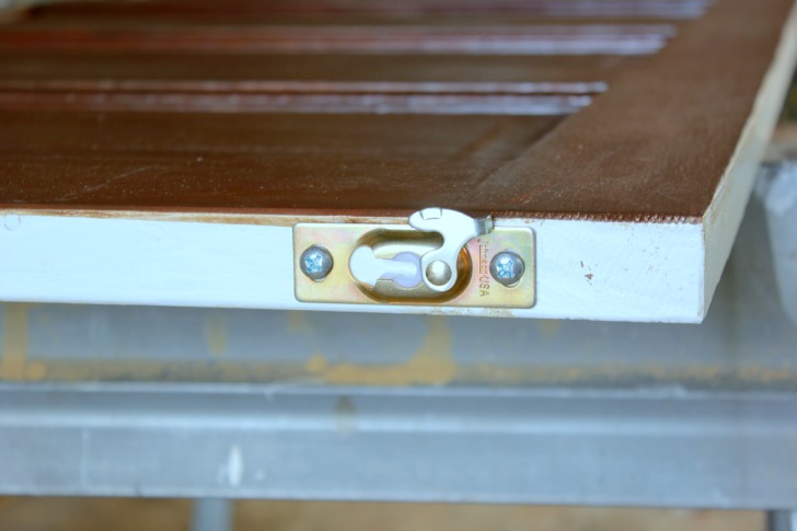 pocket door clamps to attach door to rail installed below header