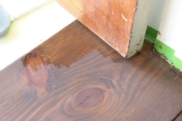 staining the front entry threshold