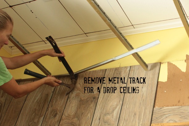 use a pry bar to remove drop ceiling track