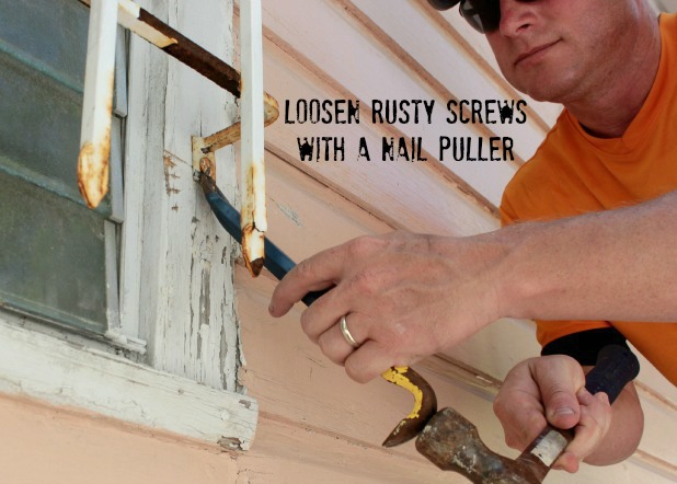 loosen rusty screws with a pry bar