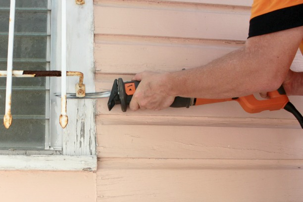 removing window bars with a reciprocating saw