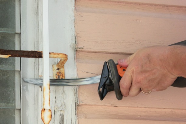 removing window bars with a sawsall